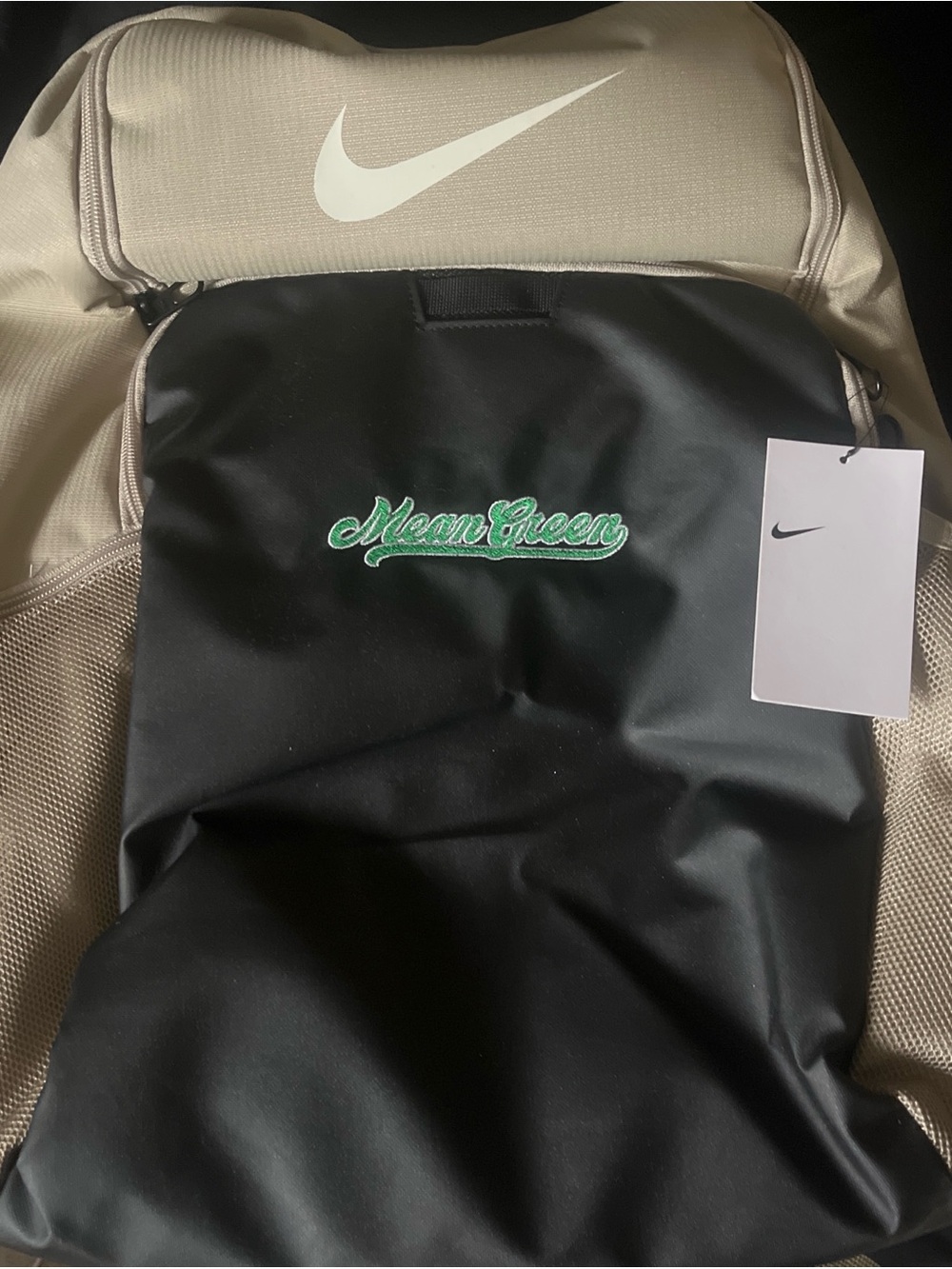 Nike Black and Beige Backpack with Green 'Mean Green' Script